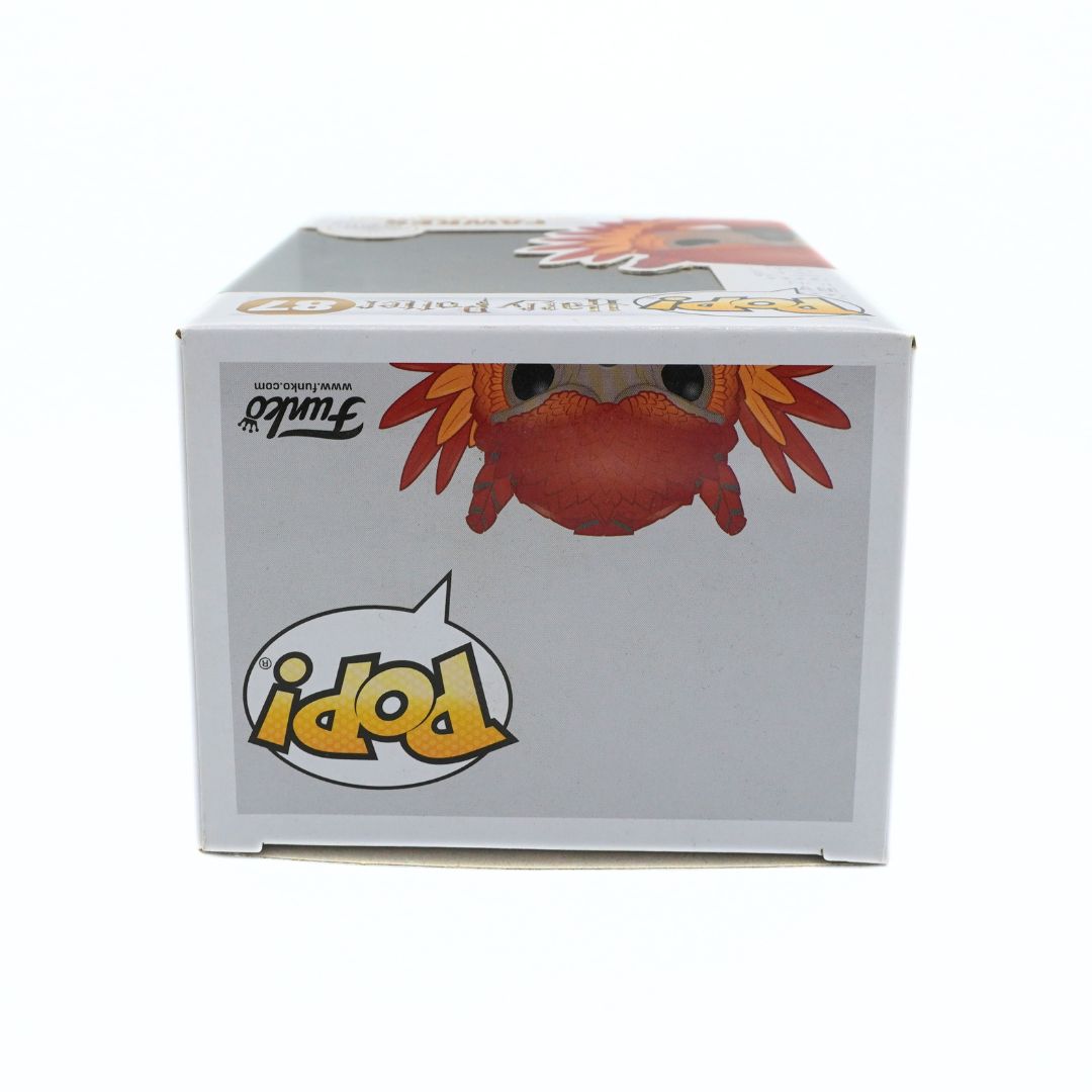 Funko Pop! vinyl figure box for Fawkes, showing the white packaging with the character's orange-red face and yellow 'Pop!' speech bubble logo on a white background.