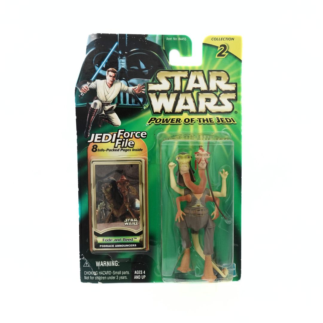 Front on photo of a 2000 Star Wars Power of the Jedi Fode and Beed figure in its original packaging with a green background