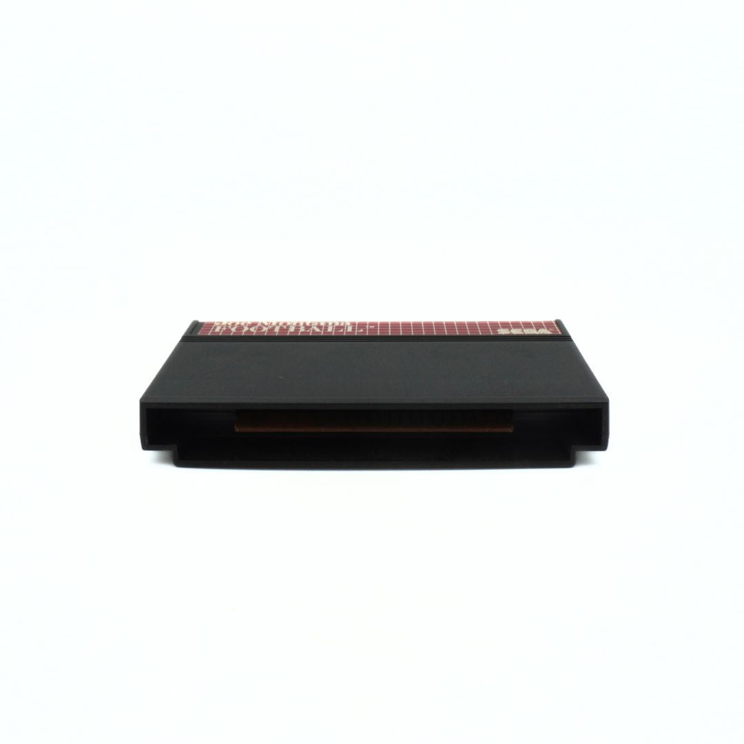 Black rectangular object with a textured top on a white background