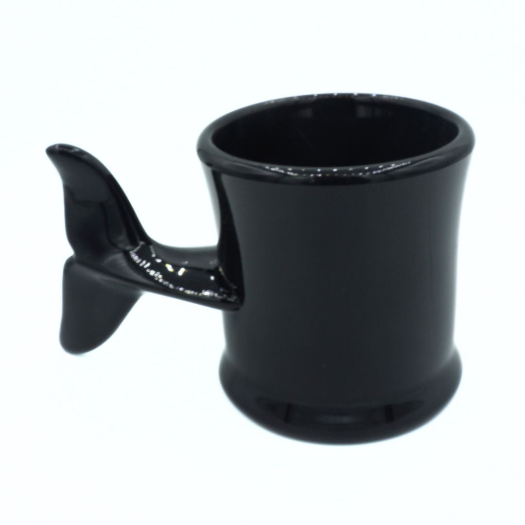 Black fish-shaped mug on a white background