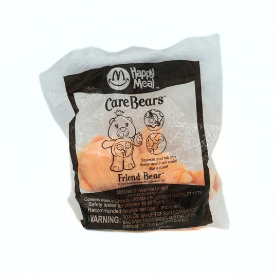 Happy Meal toy packaging featuring Care Bears on a white background