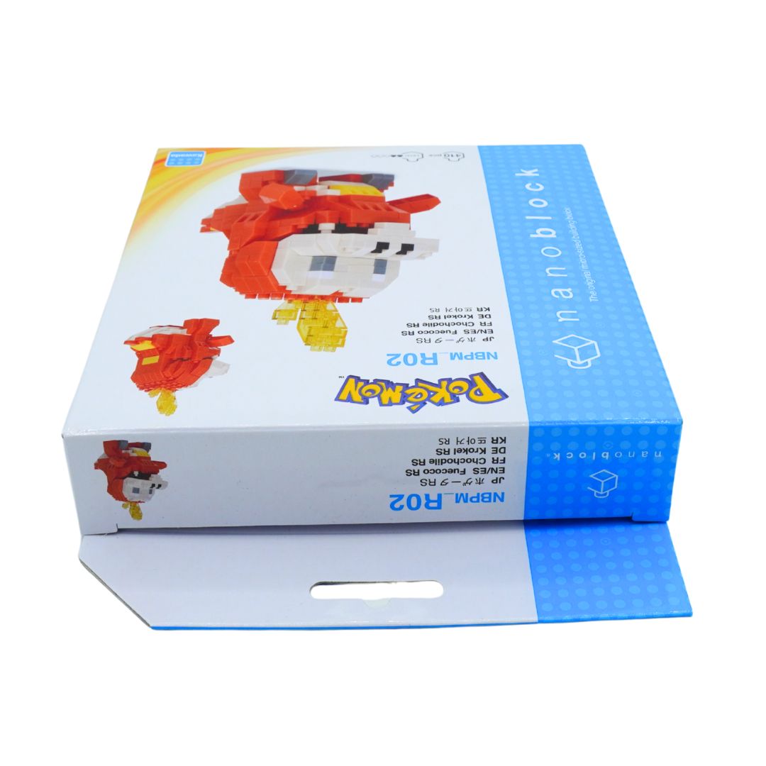 A boxed toy product on a plain white background. The packaging is predominantly white with a bright blue side panel and printed graphics showing a red-and-white bird-like character and the text 'nanoblock' and 'Pokémon'.