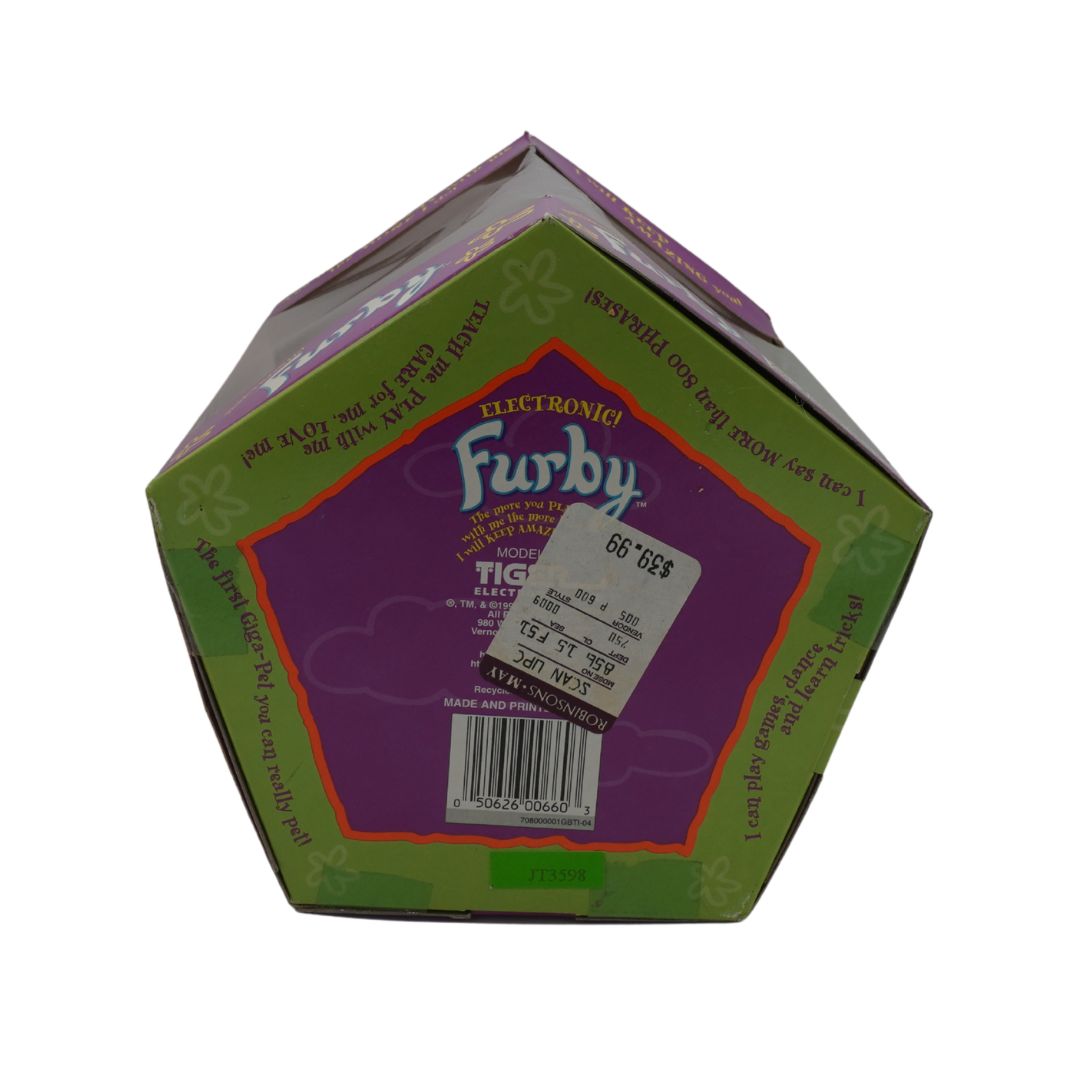 Hexagonal box of a Furby electronic toy with purple and green design