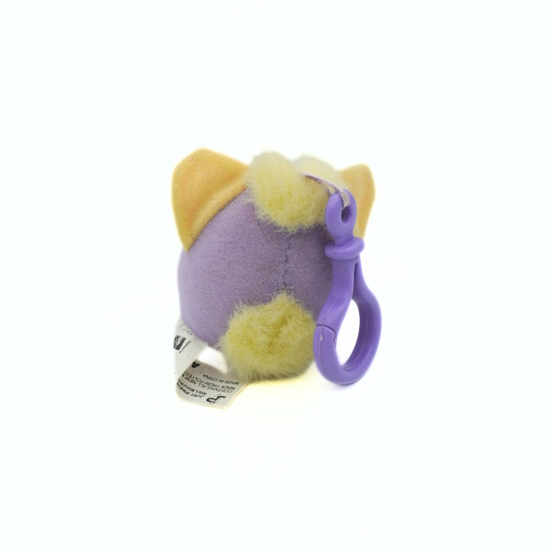 Plush keychain with purple and yellow design on a white background