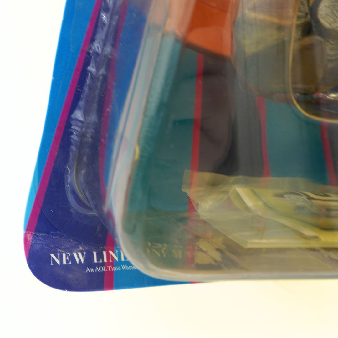 Product in clear packaging with a blue label on a white background