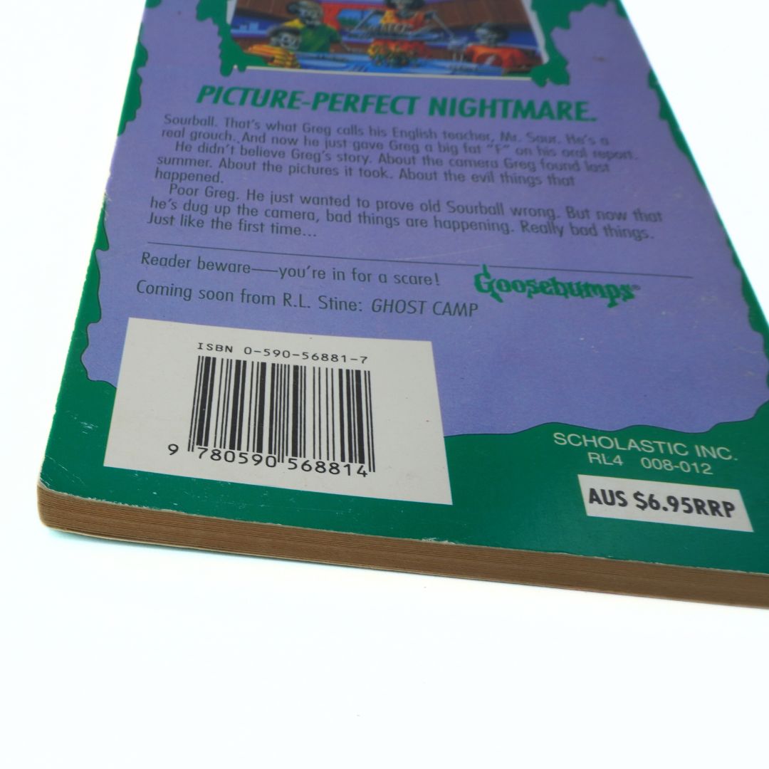 Back cover of a book with text and branding