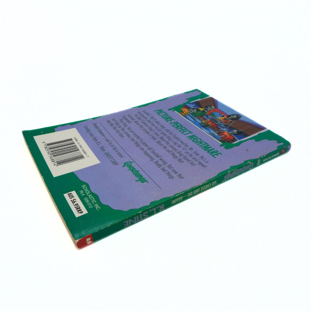 Back view of a product packaging with text and a barcode on a white background