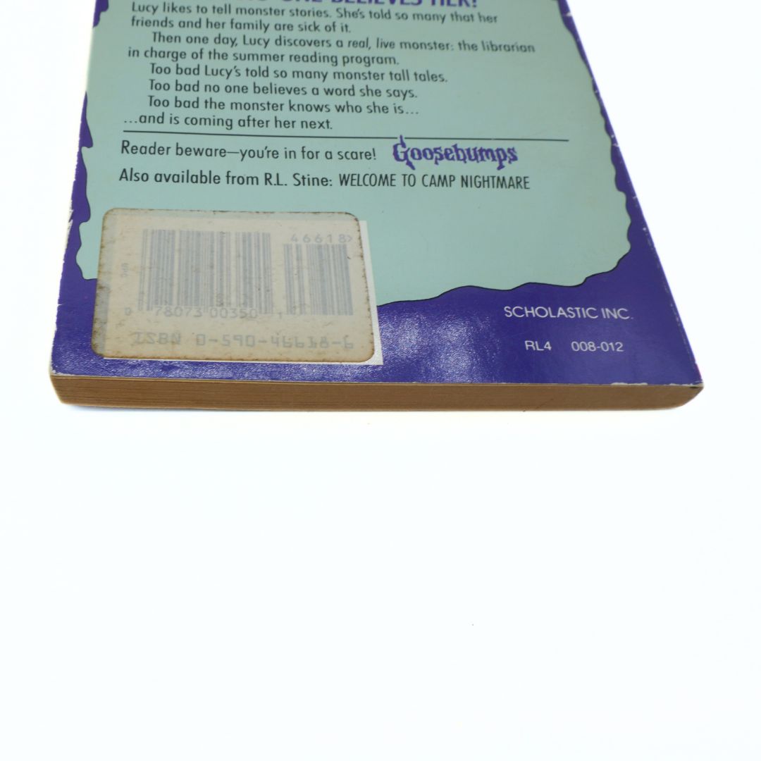 Back cover of a Goosebumps book with text and branding