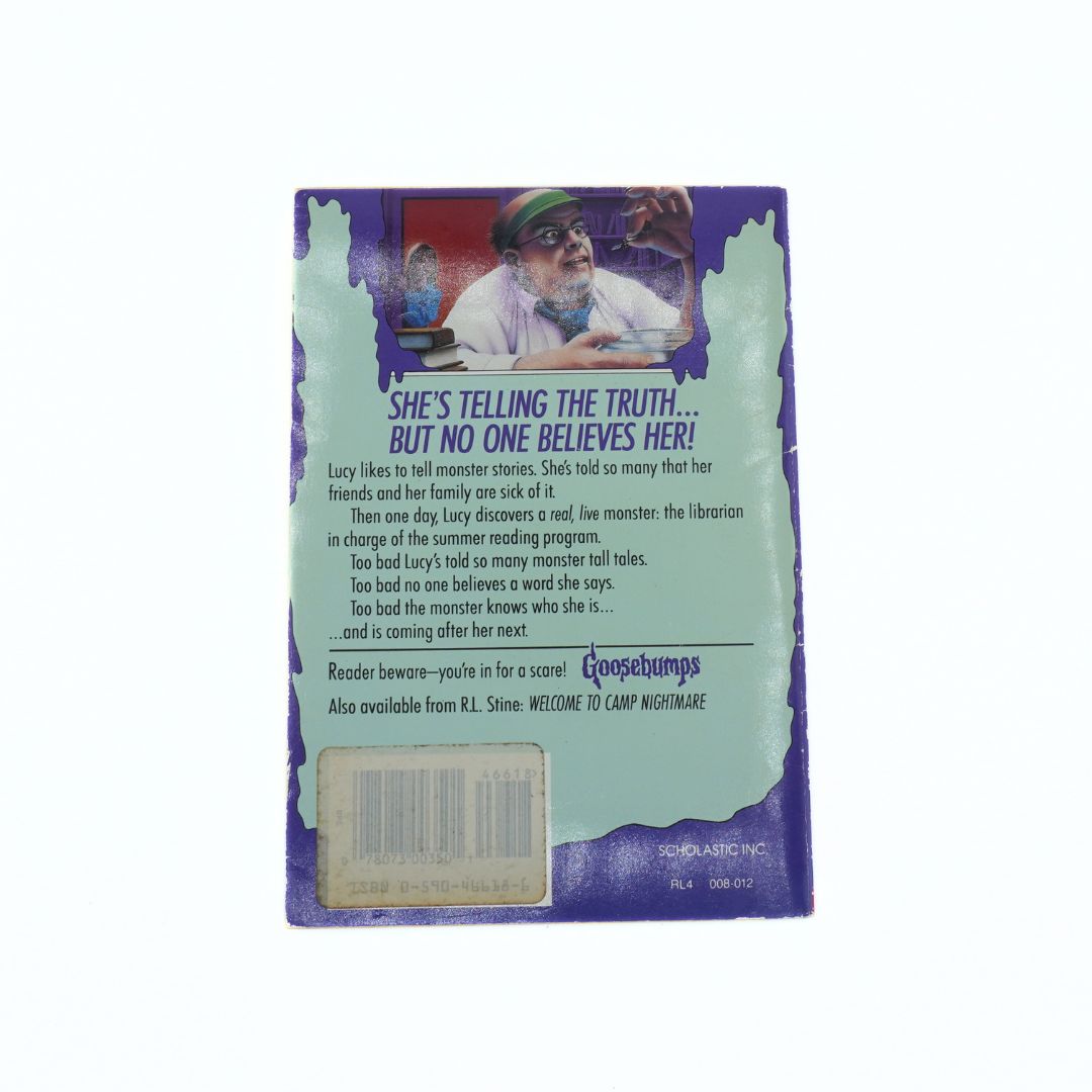 Back cover of a Goosebumps book with a character and text on a purple and green background