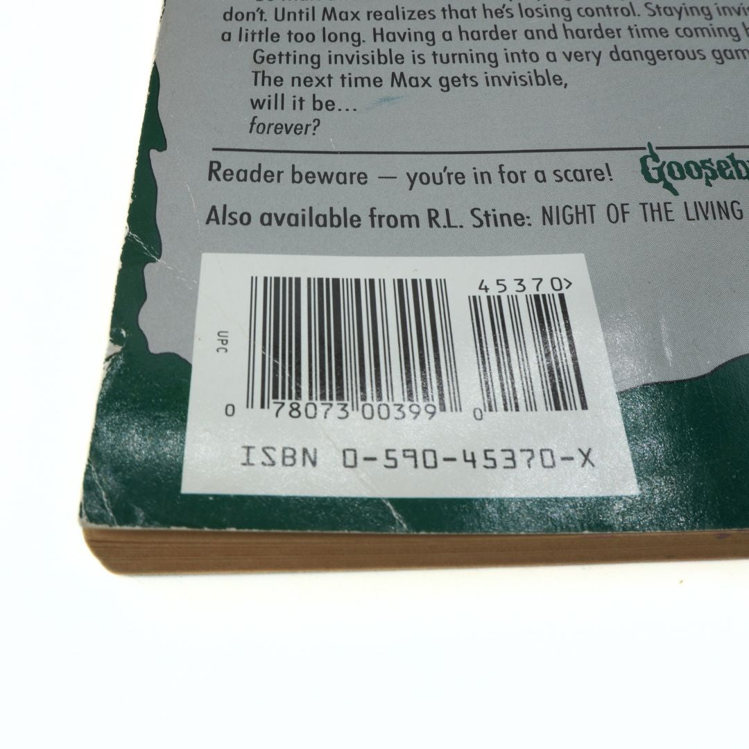 Back cover of a book with a barcode and ISBN number
