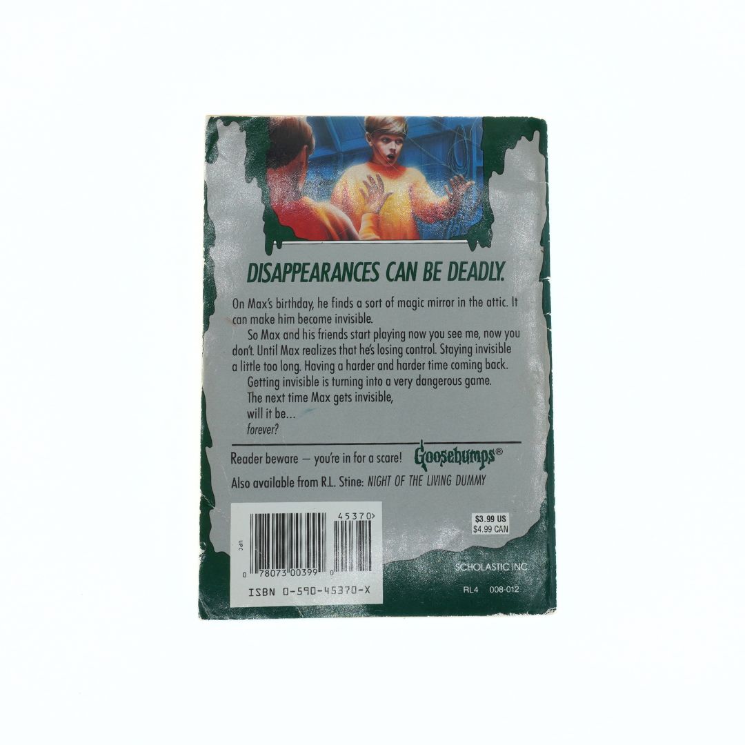 Back cover of a book with text and a barcode on a white background