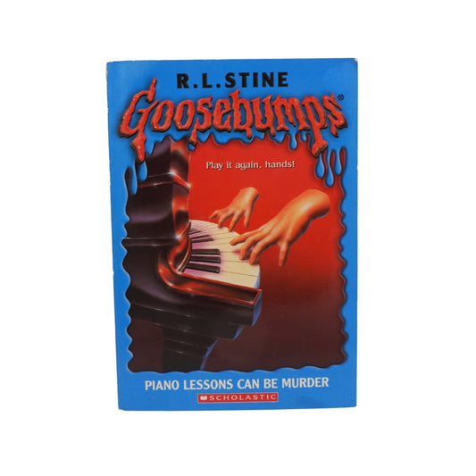 Blue and red cover of a vintage Piano Lessons Can Be Murder book