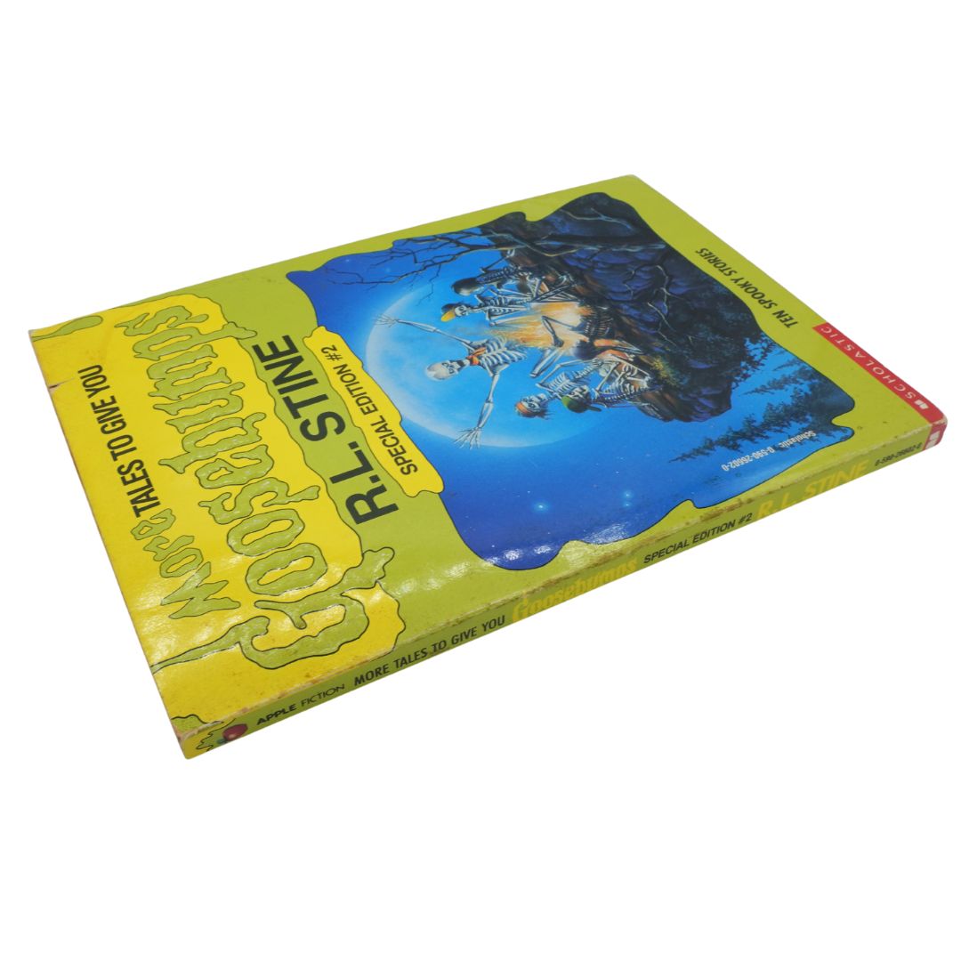 Book titled 'More Tales to Give You Goosebumps' by R.L. Stine on a white background