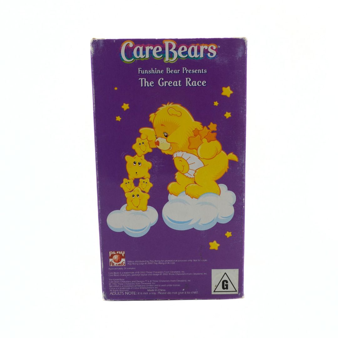 VHS cover of 'The Great Race' featuring Care Bears on a purple background