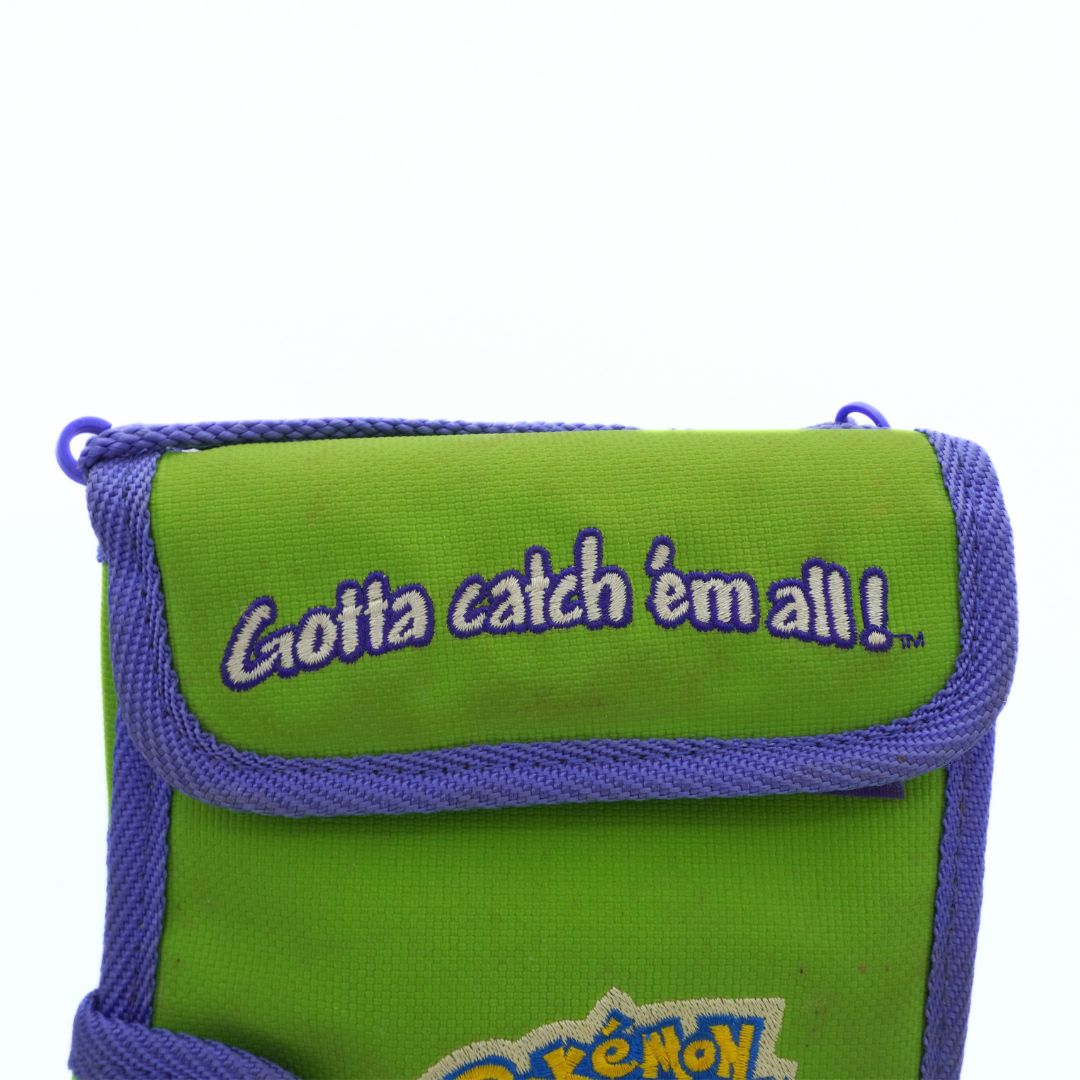 Green and purple pouch with 'Gotta catch em all!' text on a white background