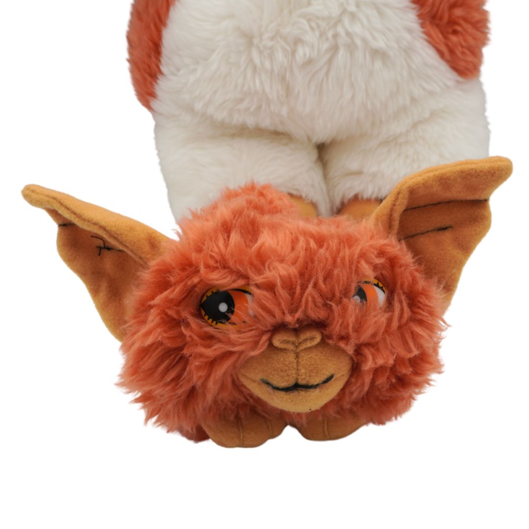 Plush toy with large ears on a white background