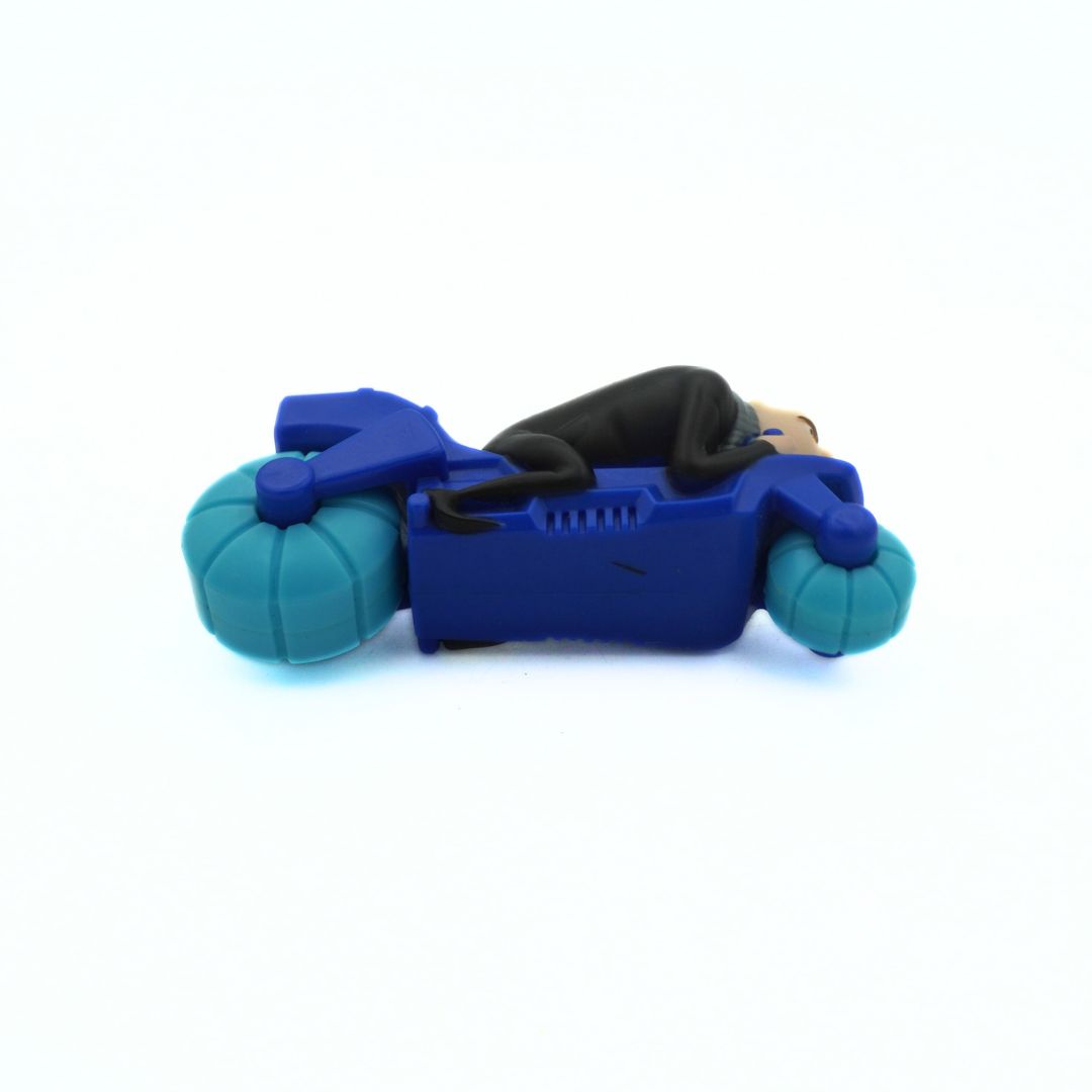 Blue and teal toy figure on a white background