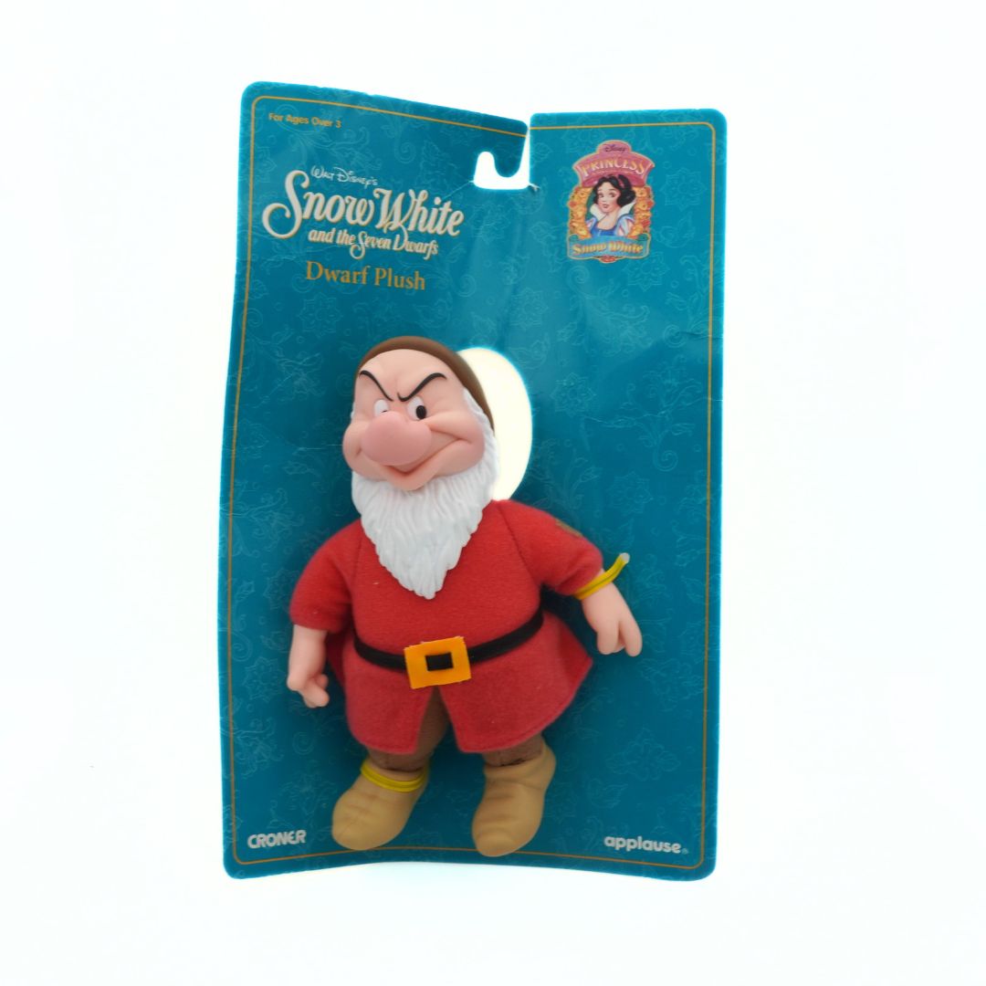 Plush toy of a dwarf from Snow White and the Seven Dwarfs on a blue packaging background