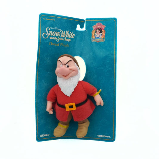 Plush toy of a dwarf from Snow White and the Seven Dwarfs on a blue packaging background