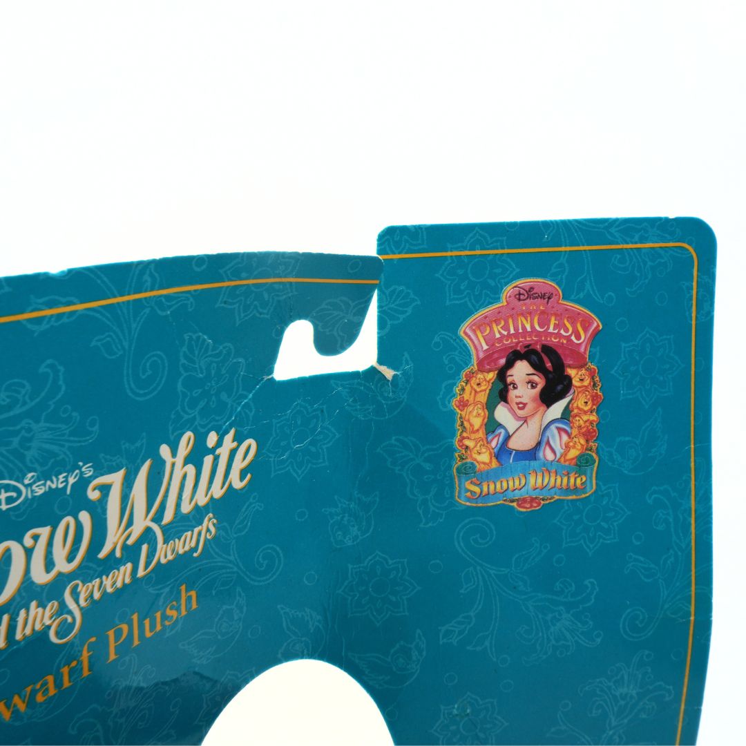 Blue packaging with Snow White logo and text on a white background