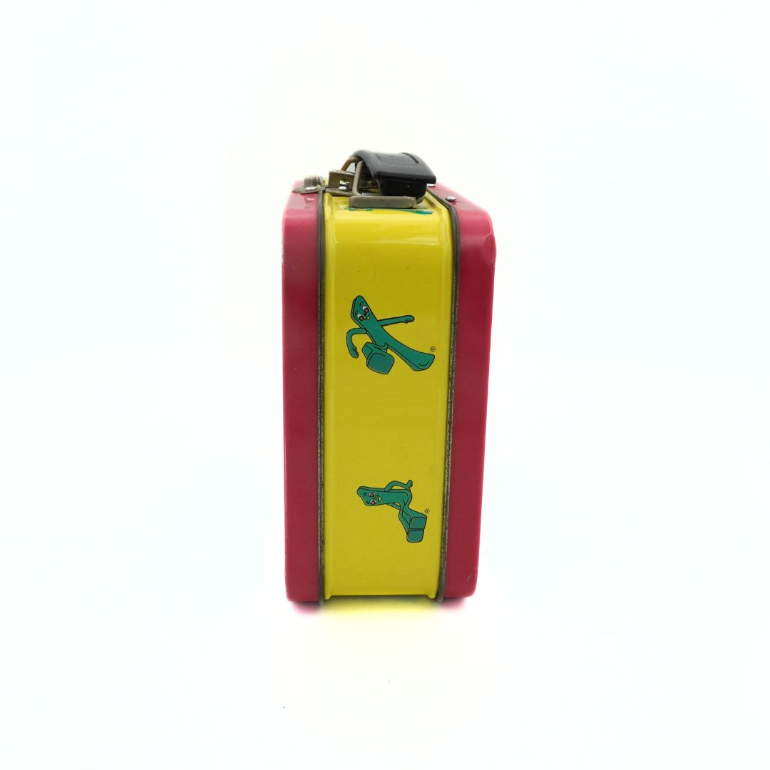 Side on photo of a vintage Gumby lunchbox with a red and yellow colour palette, featuring Gumby in various poses