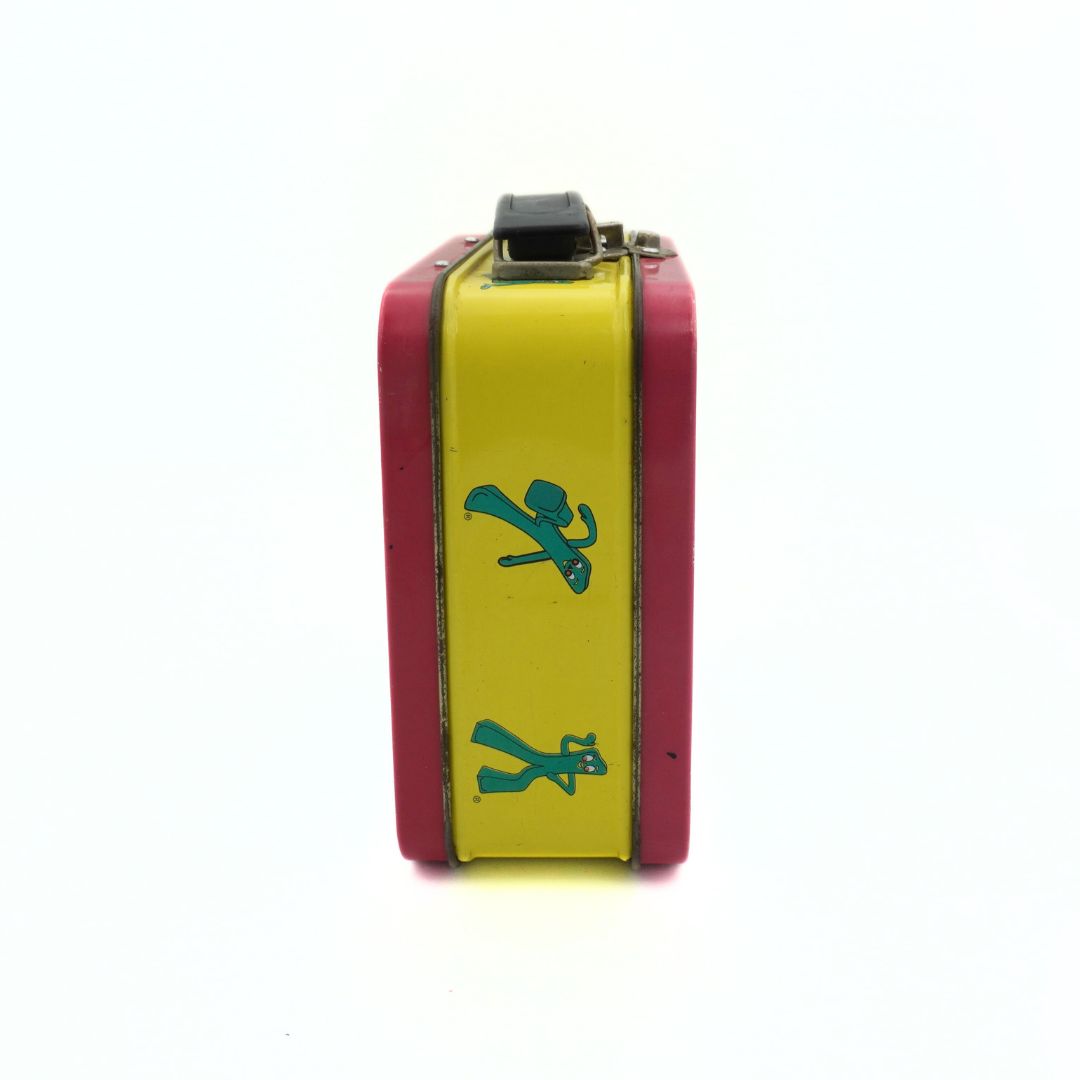 Side on photo of a vintage Gumby lunchbox with a red and yellow colour palette, featuring Gumby in various poses