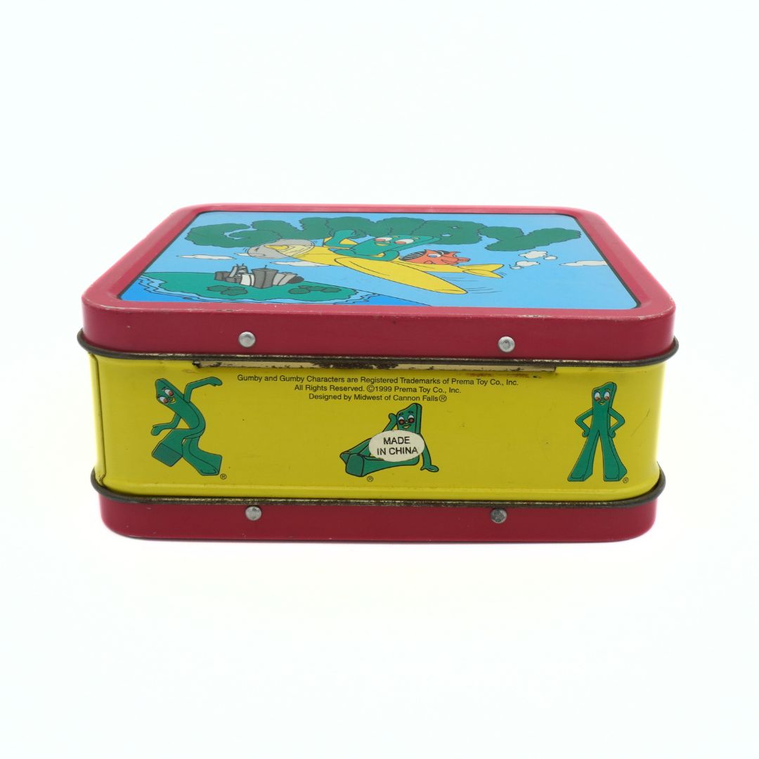 Underside of a vintage 1999 Gumby lunchbox featuring Prema and Midwest of Cannon Falls copyright information