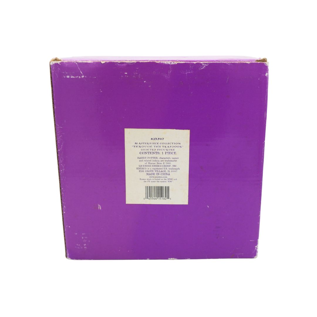 A purple cardboard box with a white label in the center, photographed against a plain white background.