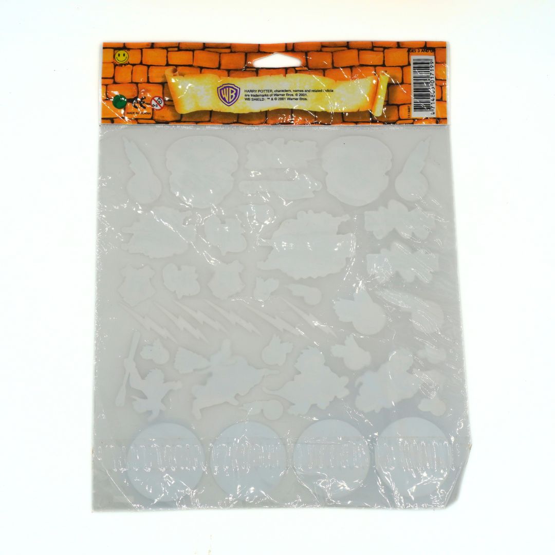Clear plastic sticker sheet in a Warner Bros branded packaging on a white background