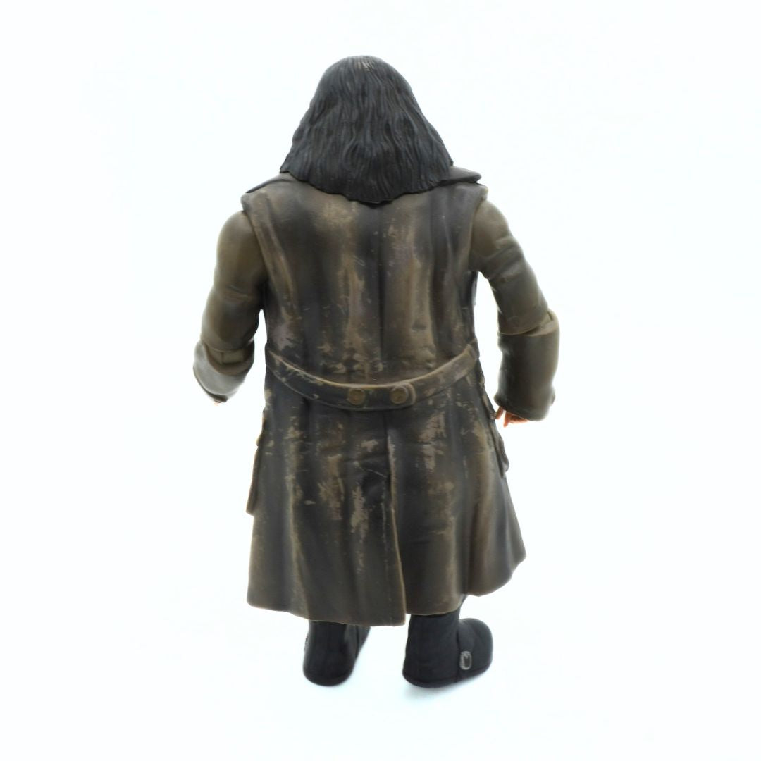 Action figure wearing a long coat on a white background