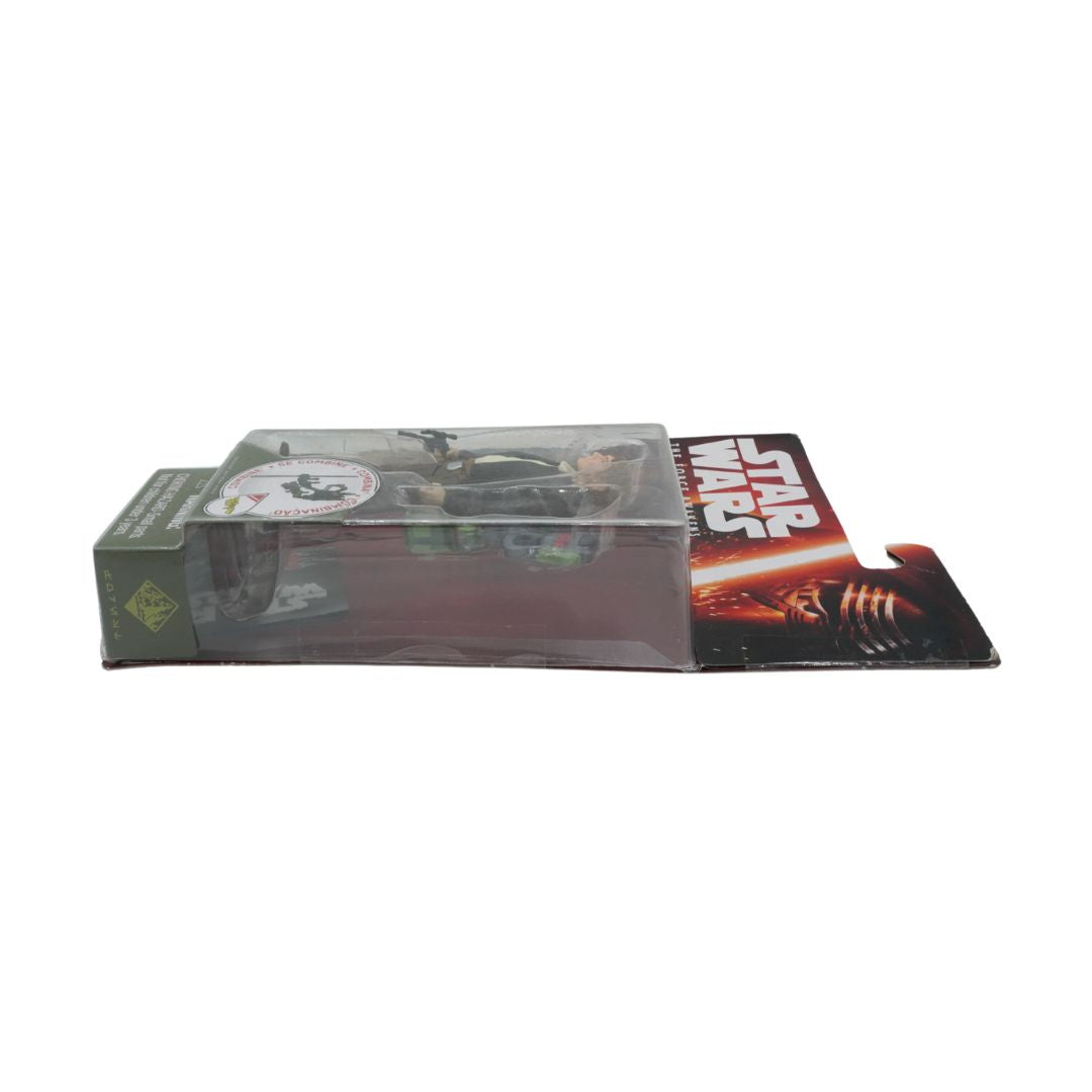 SIde on photo of a Han Solo figurine in red and black packaging
