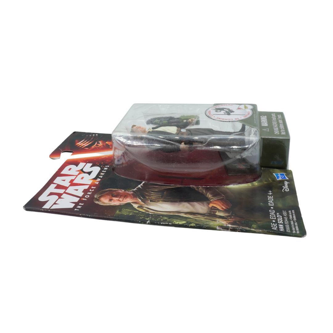 Star Wars action figure in packaging with character image on display stand