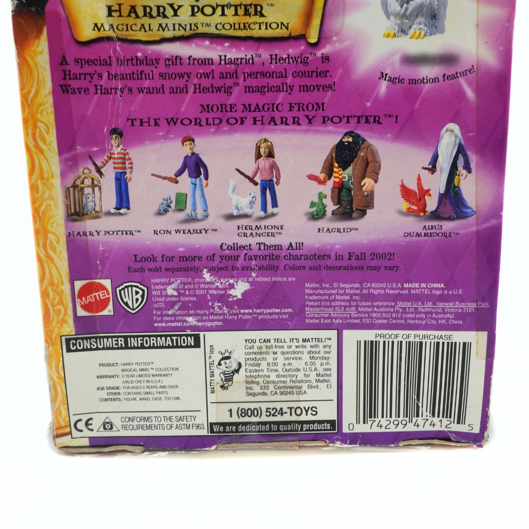 Back of a Harry Potter toy packaging with character illustrations and branding.