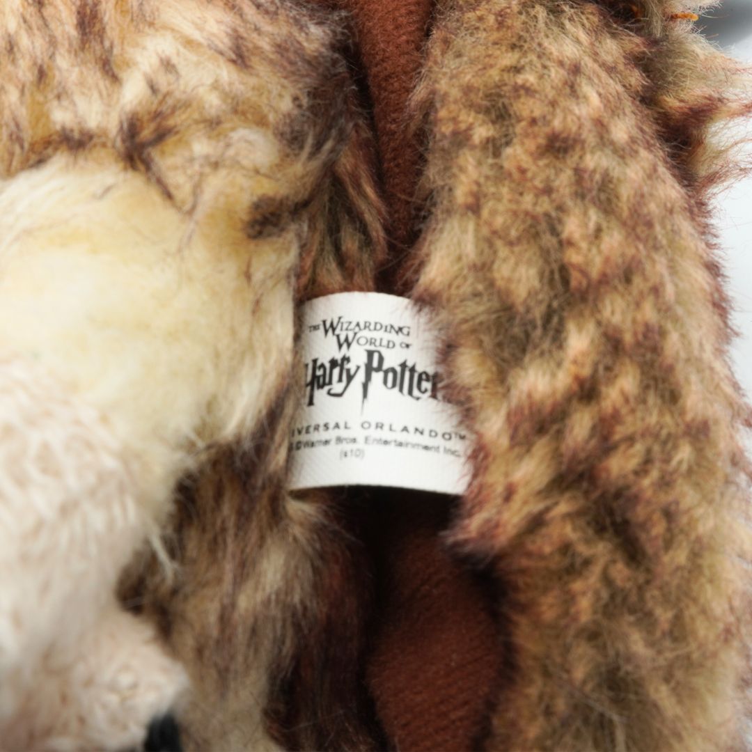 Plush toy with a 'Harry Potter' label, featuring a character from the wizarding world.