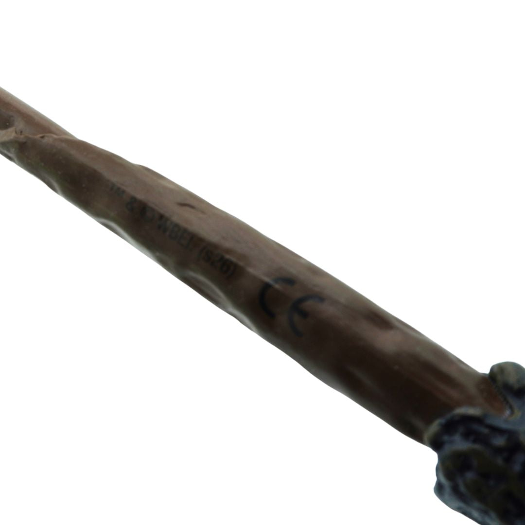 A close-up of a textured brown wooden wand handle with a dark blue and black decorative end, shown against a plain white background.