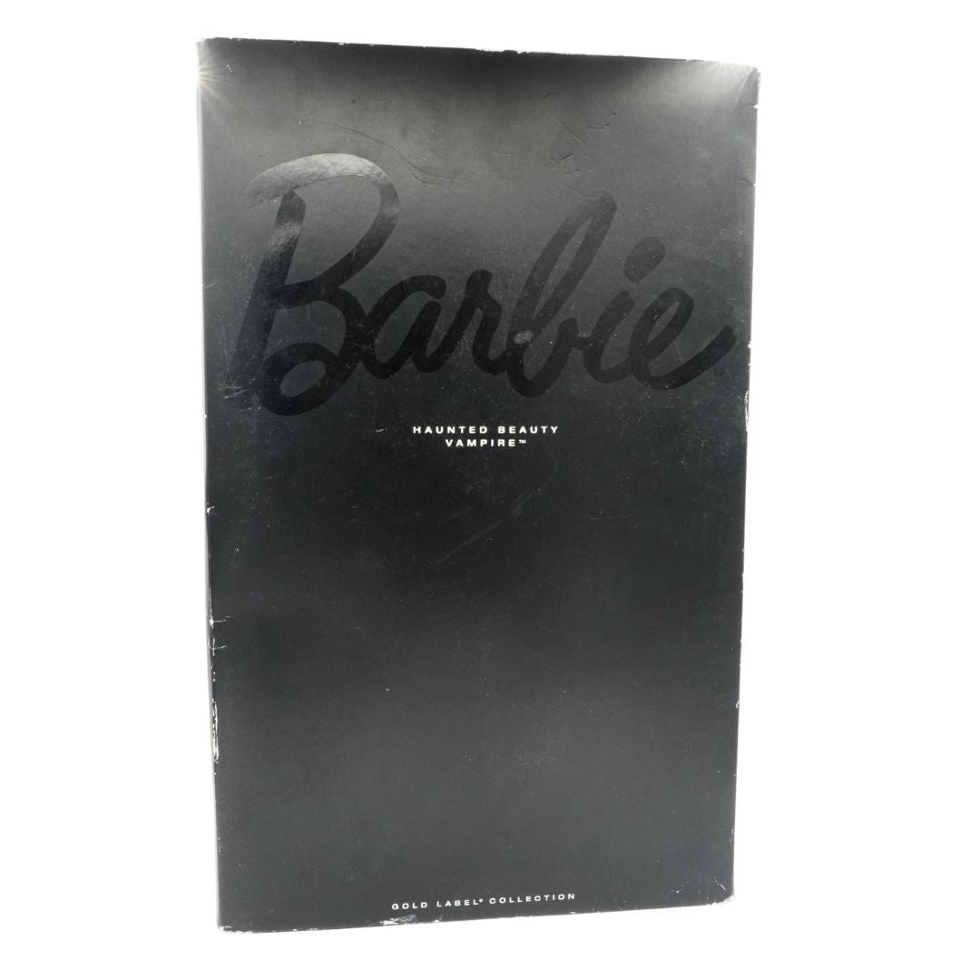 Black Barbie book with 'Barbie' and 'Haunted Beauty Vampire' text on a white background