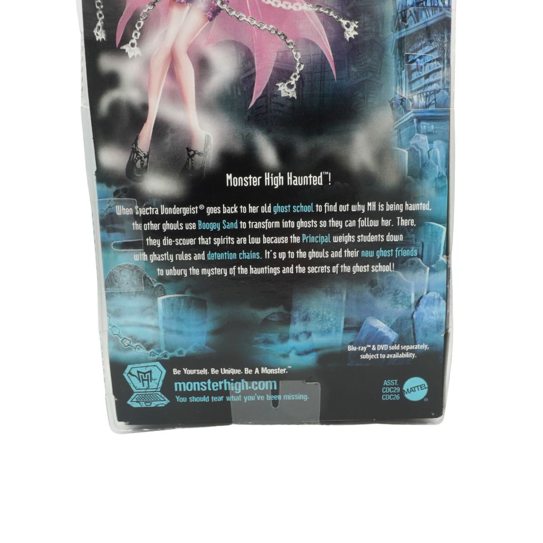 Monster High Haunted box packaging with ghostly imagery and text.