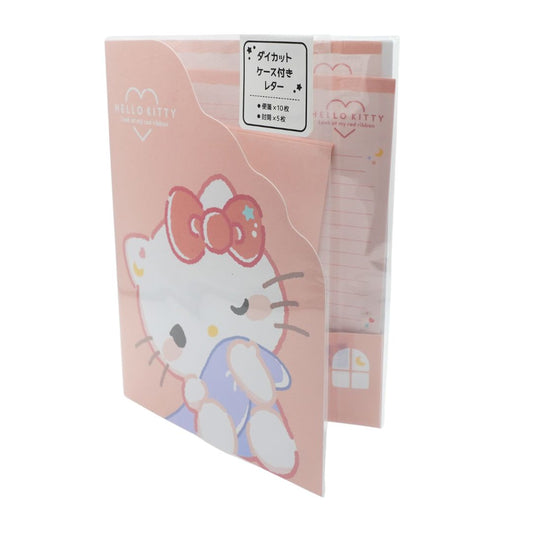 A pink Hello Kitty letter set featuring a white cat holding a blue blanket