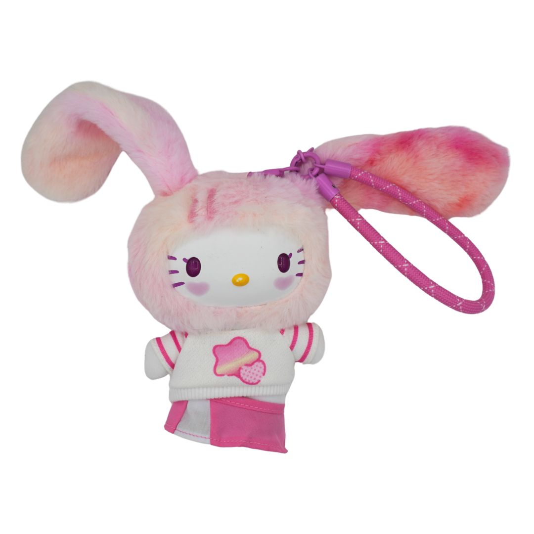 A pink and white Hello Kitty plush bunny keychain with long fluffy bunny ears and a pink strap, shown on a plain white background.