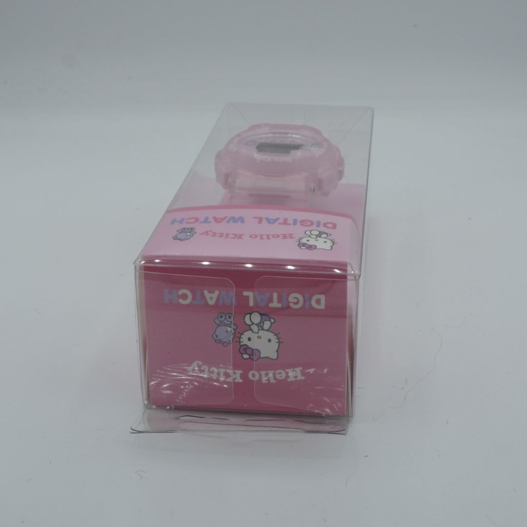 Pink digital watch packaging with Hello Kitty design on a white background