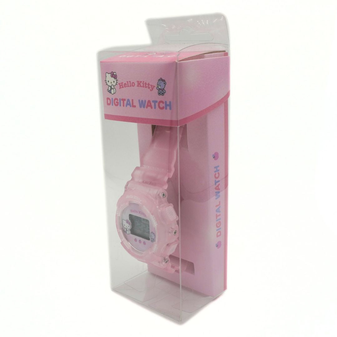 Pink digital watch in clear packaging with Hello Kitty branding on a white background