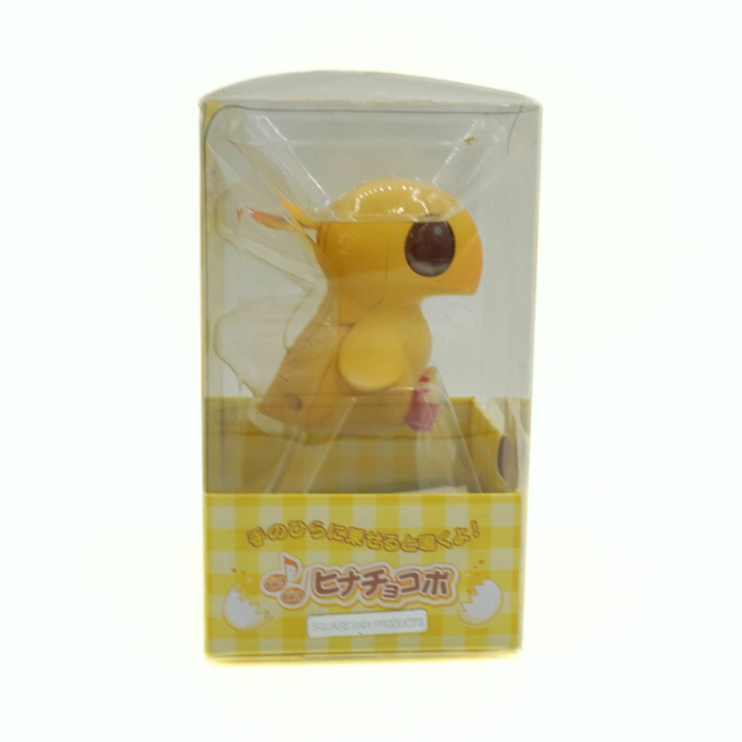 Yellow cartoon character in packaging on a white background