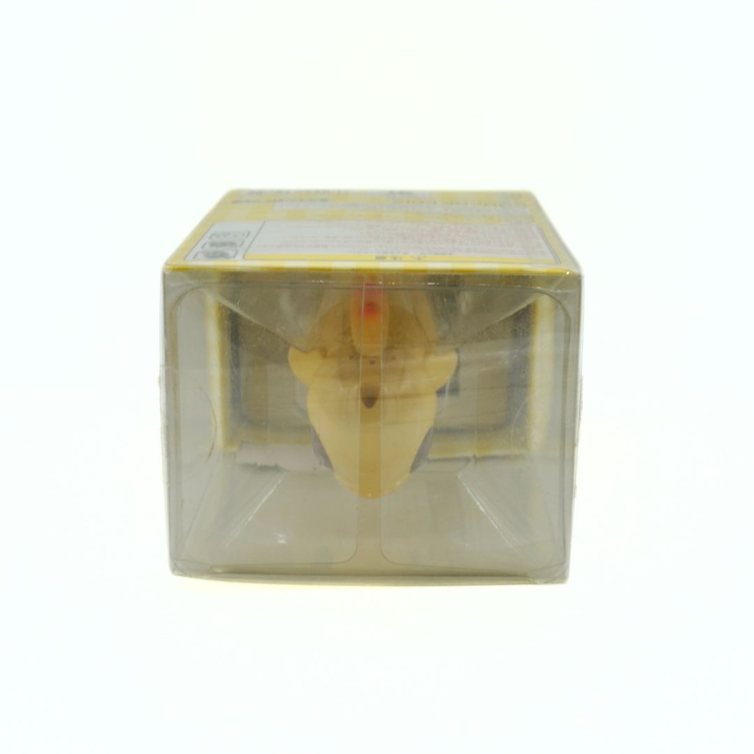 Clear plastic packaging with a yellow object inside on a white background