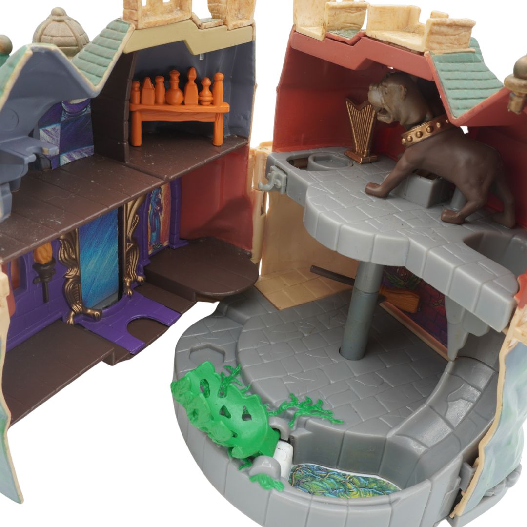 Toy set with a castle-like structure featuring a lion and various rooms.