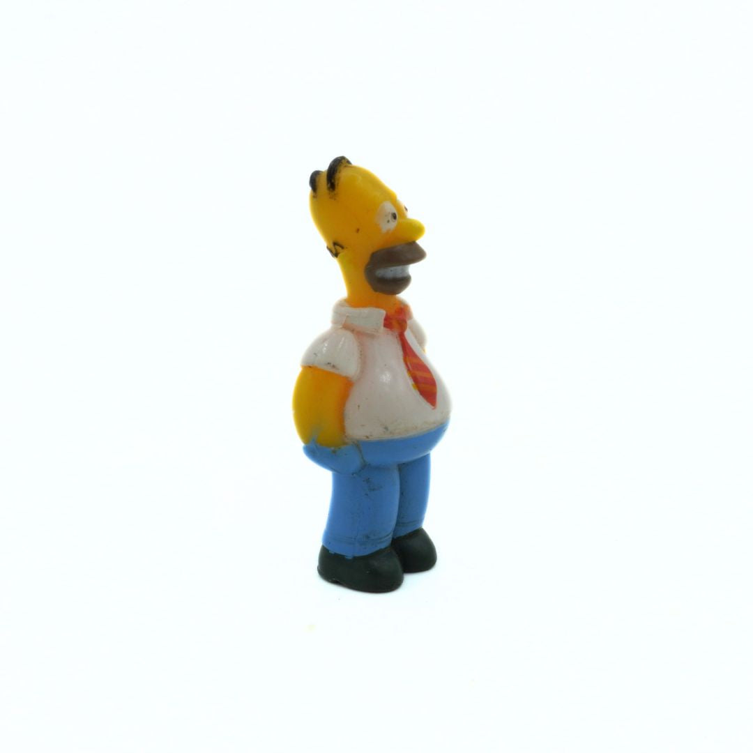 Figurine of a cartoon character with a white background