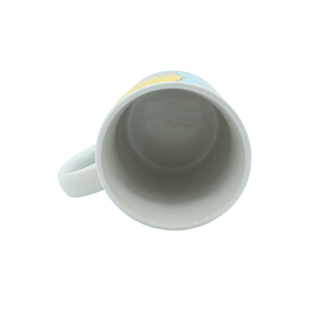 White mug with a small yellow design on a white background