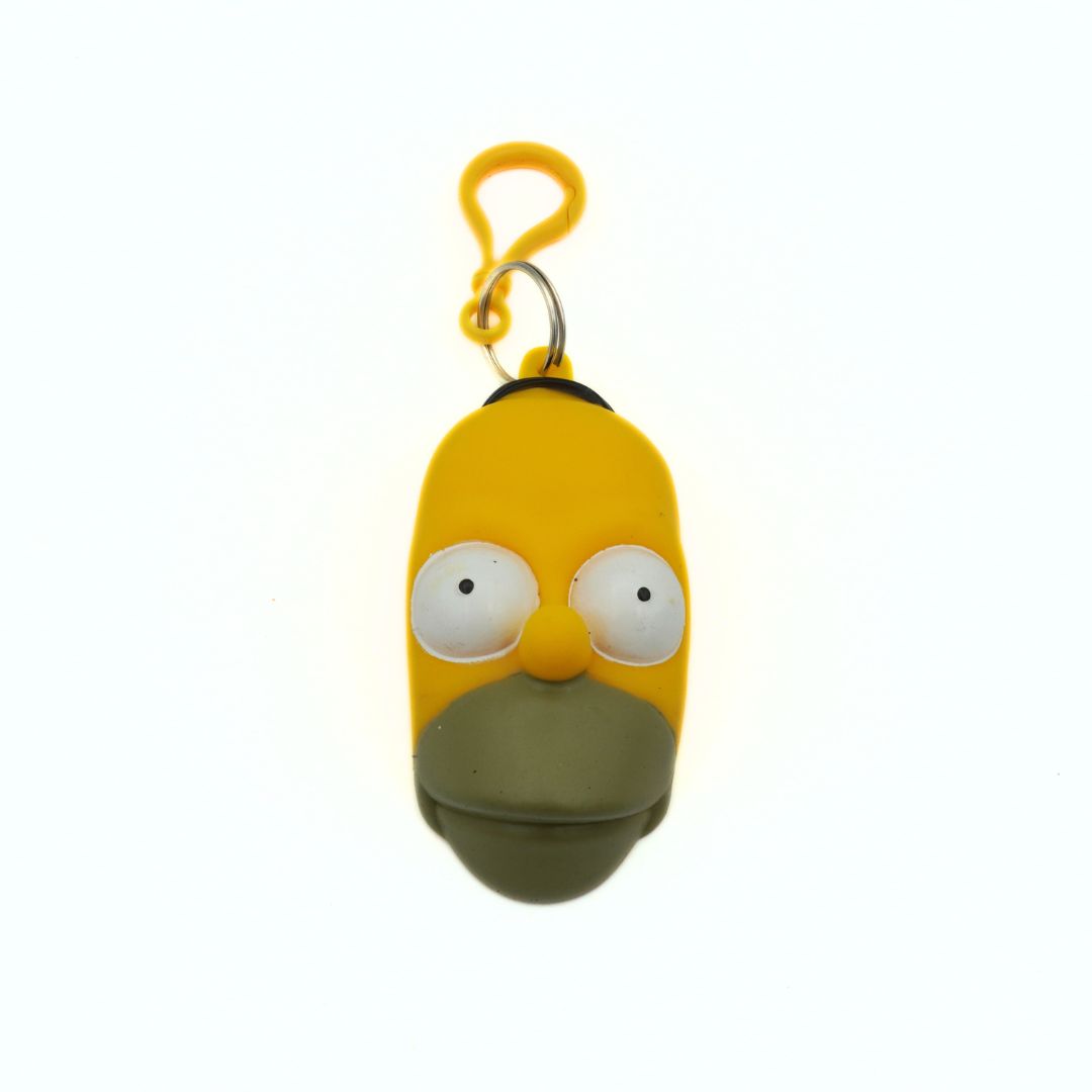 A vintage 90s Simpsons coin purse of Homer Simpsons head