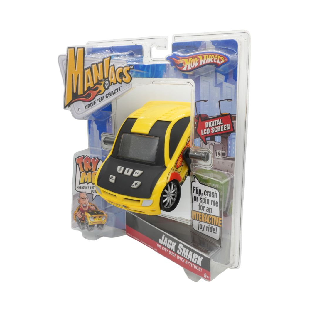 Toy car in packaging with 'Maniacs' and 'Hot Wheels' branding on a white background
