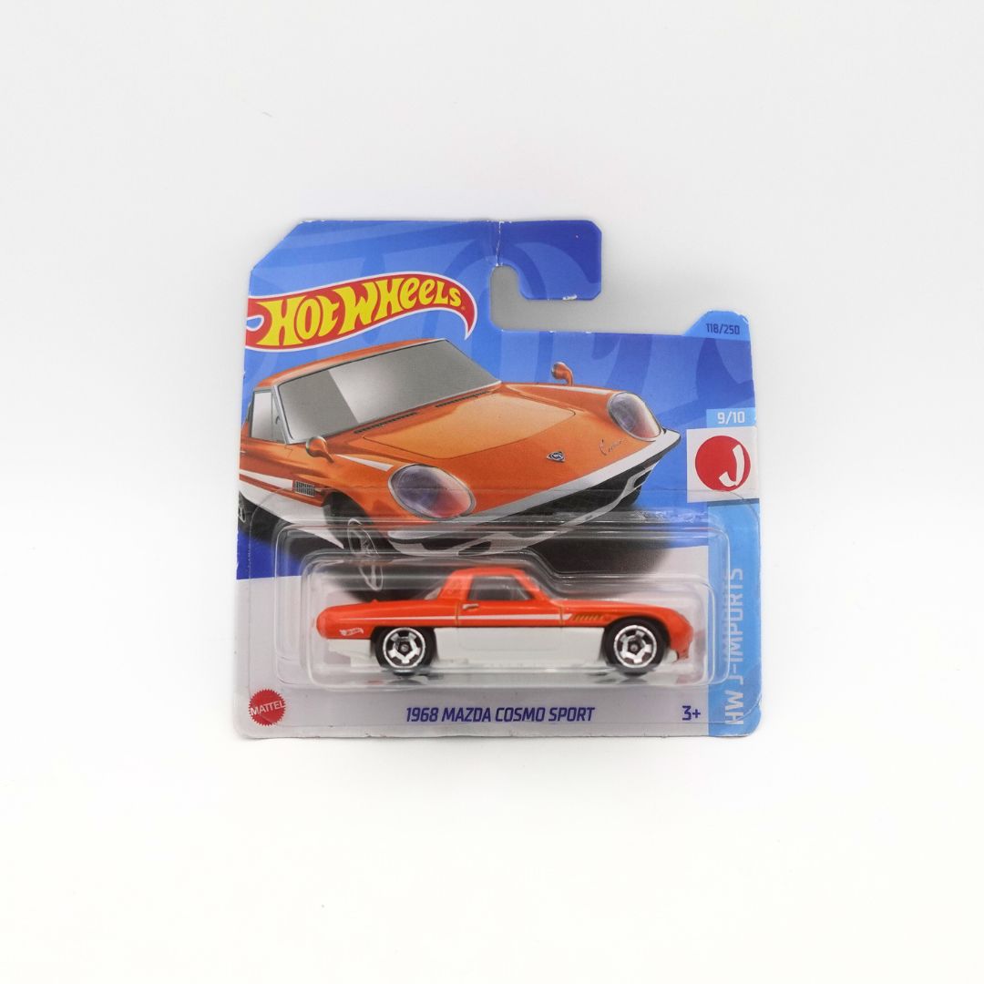 Front on photo of the 2023 release 1968 Mazda Cosmo Sport Hot Wheels toy, on a short blue and orange cardback