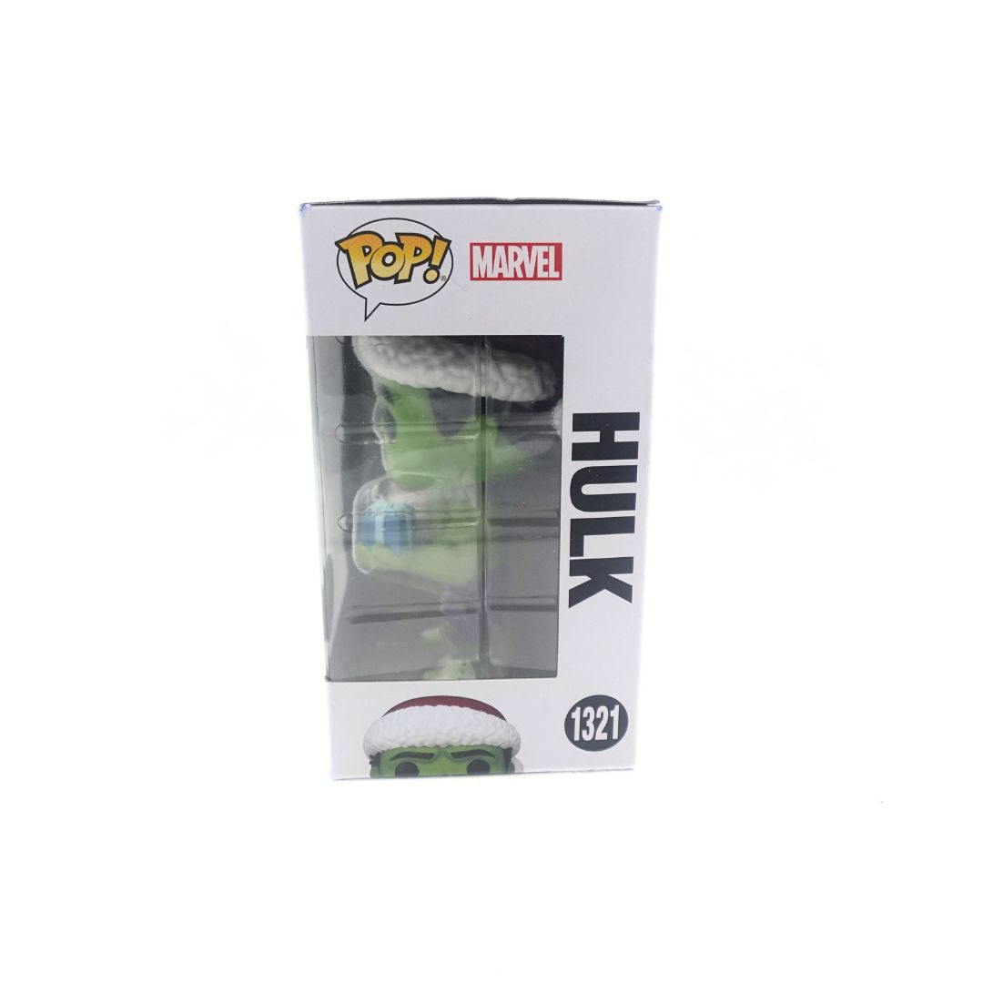 Side on photo of the Hulk 1321 Funko Pop special Christmas edition